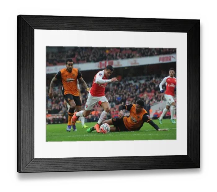 Framed Print : Clash of Titans: Sanchez vs. Davies in FA Cup Battle at Emirates Framed Print : Clash of Titans: Sanchez vs. Davies in FA Cup Battle at Emirates