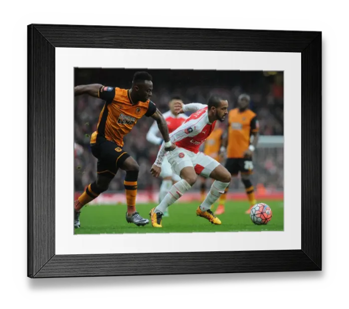 Framed Print : Theo Walcott vs. Moses Odubajo: A FA Cup Fifth Round Showdown at Arsenal's Emirates Stadium