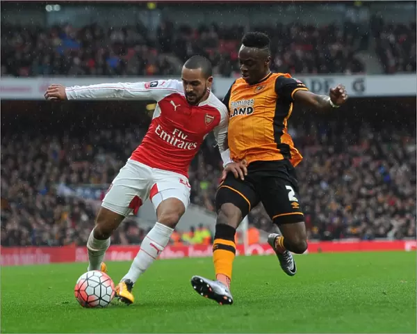Theo Walcott (Arsenal) Moses Odubajo (Hull). Arsenal 0: 0 Hull City. FA Cup 5th Round