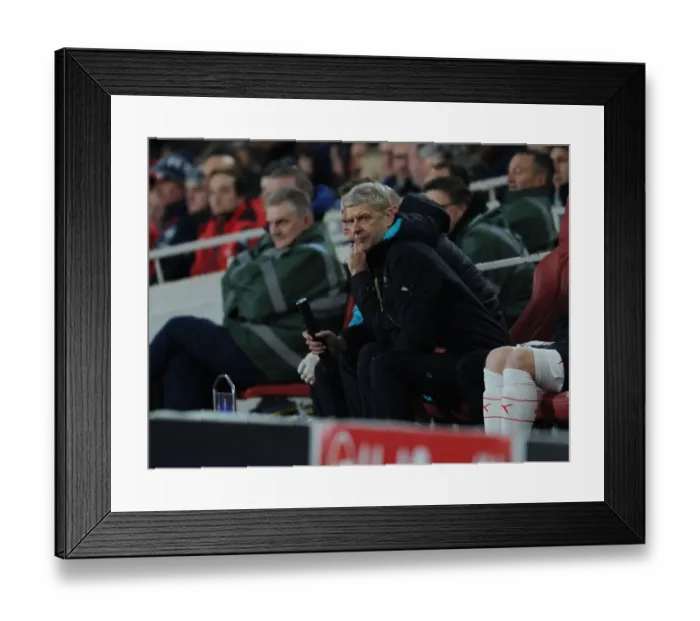 Framed Print : Arsene Wenger and Arsenal FC Face Off Against FC Barcelona in UEFA Champions League Round of 16 (First Leg)