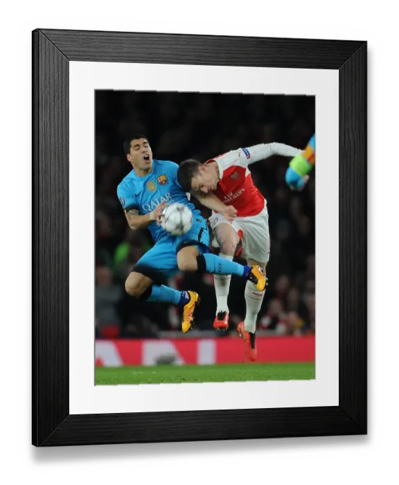 Framed Print : Koscielny vs. Suarez: A Champions League Battle at the Emirates Framed Print : Koscielny vs. Suarez: A Champions League Battle at the Emirates