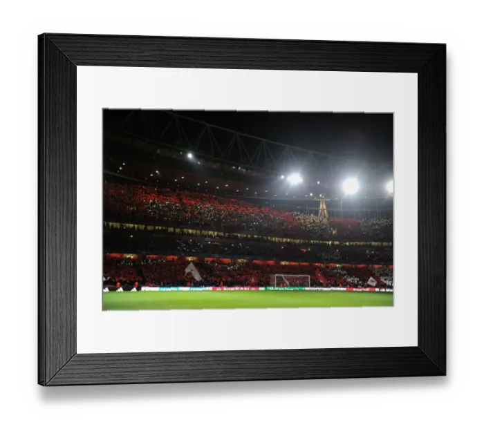 Framed Print : Arsenal vs. Barcelona: The Thrill of the UEFA Champions League Clash at Emirates Stadium