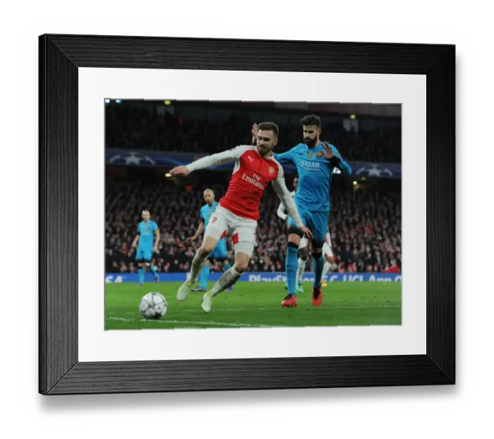 Framed Print : Ramsey Outmaneuvers Pique: Arsenal's Masterclass Moment in 2016 Champions League Clash Framed Print : Ramsey Outmaneuvers Pique: Arsenal's Masterclass Moment in 2016 Champions League Clash