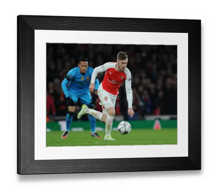 Framed Print : Arsenal's Aaron Ramsey Faces Off Against FC Barcelona in the 2015 / 16 UEFA Champions League