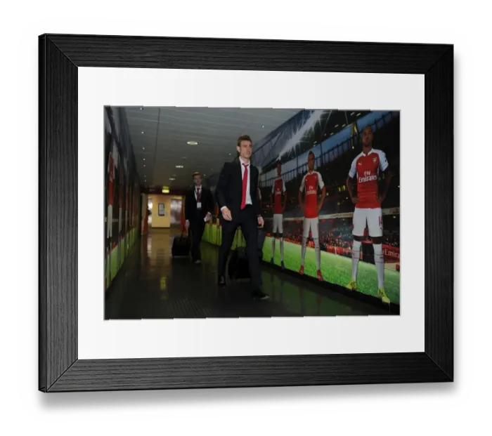 Framed Print : Laurent Koscielny's Farewell Stroll: Arsenal FC vs. FC Barcelona (2016) - The Last Walk Before the UCL Showdown