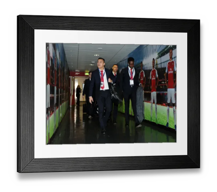Framed Print : Arsenal FC: Sanchez and Welbeck Head to the Changing Room Before UCL Showdown vs. FC Barcelona (2016)