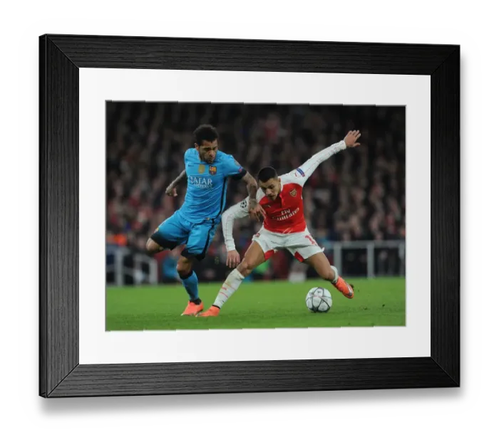 Framed Print : Sanchez vs. Alves: A Champions League Showdown - Arsenal's Star Clash with Barcelona