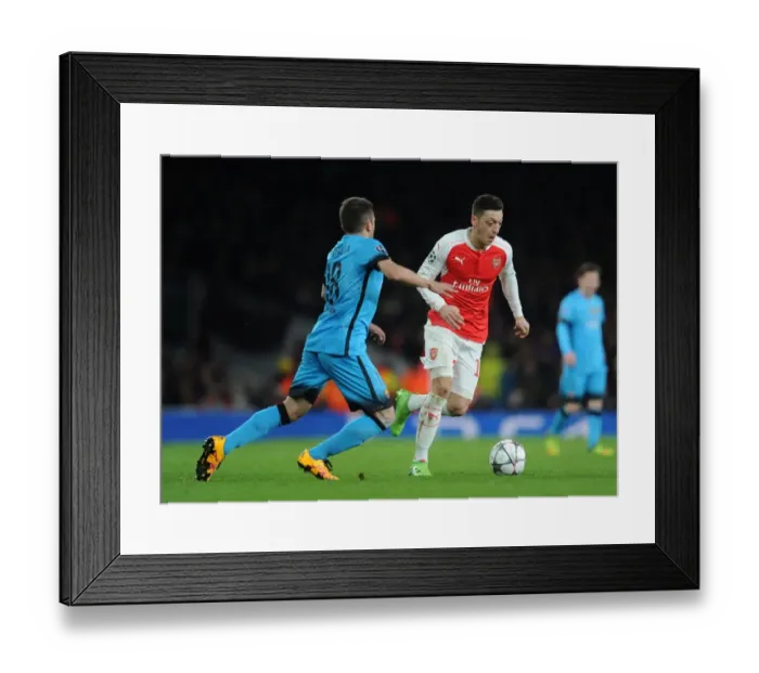 Framed Print : Mesut Ozil vs. Jordi Alba: A Champions League Battle at the Emirates Framed Print : Mesut Ozil vs. Jordi Alba: A Champions League Battle at the Emirates