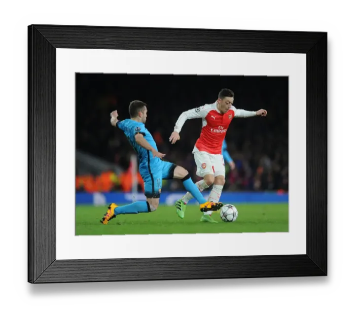 Framed Print : Mesut Ozil vs. Jordi Alba: A Champions League Battle at the Emirates Framed Print : Mesut Ozil vs. Jordi Alba: A Champions League Battle at the Emirates