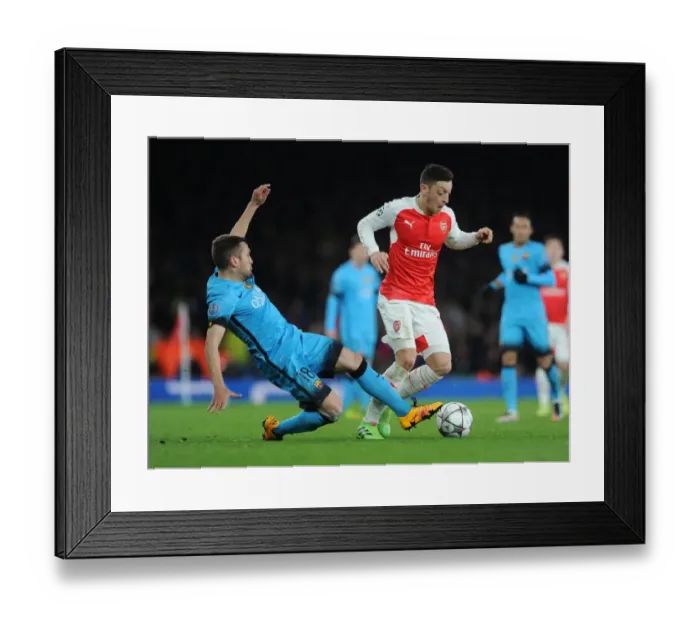 Framed Print : Ozil vs. Alba: A Champions League Showdown - Arsenal vs. Barcelona Framed Print : Ozil vs. Alba: A Champions League Showdown - Arsenal vs. Barcelona