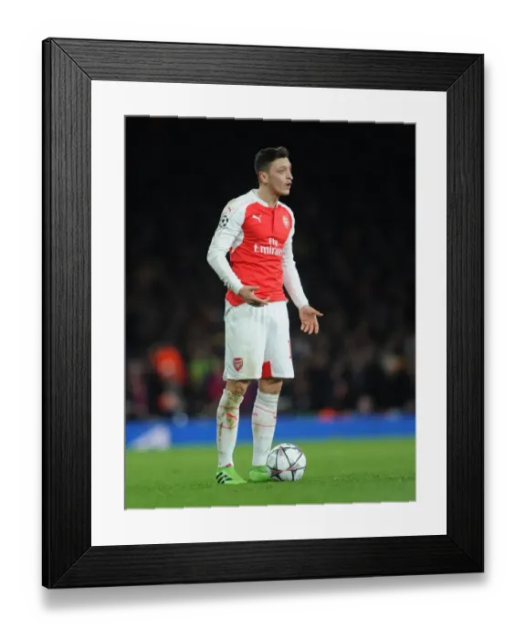Framed Print : Mesut Ozil in Action: Arsenal FC vs. FC Barcelona - UEFA Champions League 2015 / 16 Round of 16, First Leg