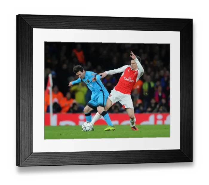 Framed Print : Koscielny's Defiant Stand: Arsenal vs. Barcelona - Messi Thwarted
