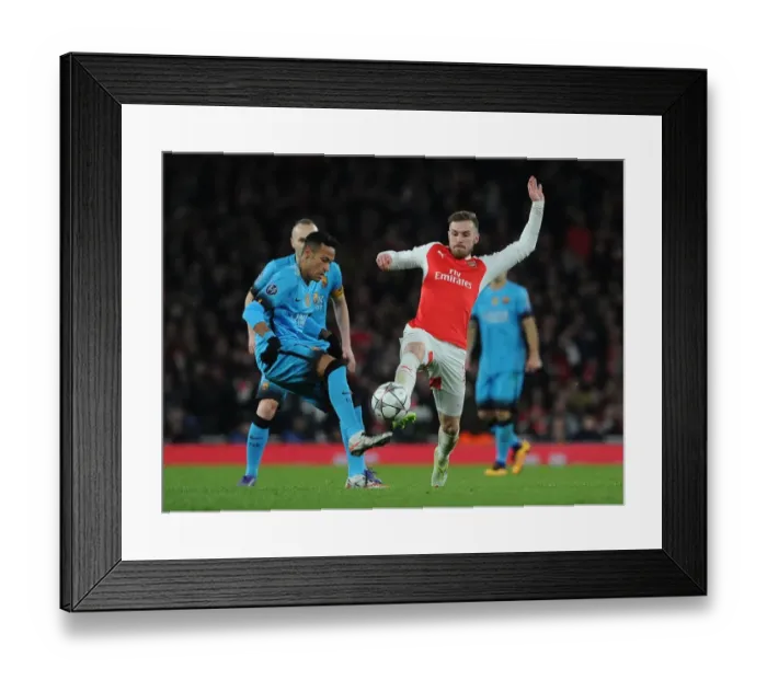Framed Print : Ramsey's Tenacious Tackle: Arsenal vs. Barcelona - Champions League Showdown Framed Print : Ramsey's Tenacious Tackle: Arsenal vs. Barcelona - Champions League Showdown