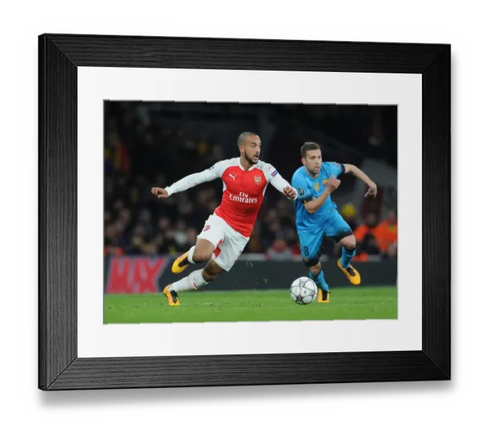 Framed Print : Theo Walcott vs. Jordi Alba: A Battle of Wings in Arsenal vs. Barcelona Champions League Clash (2015 / 16)