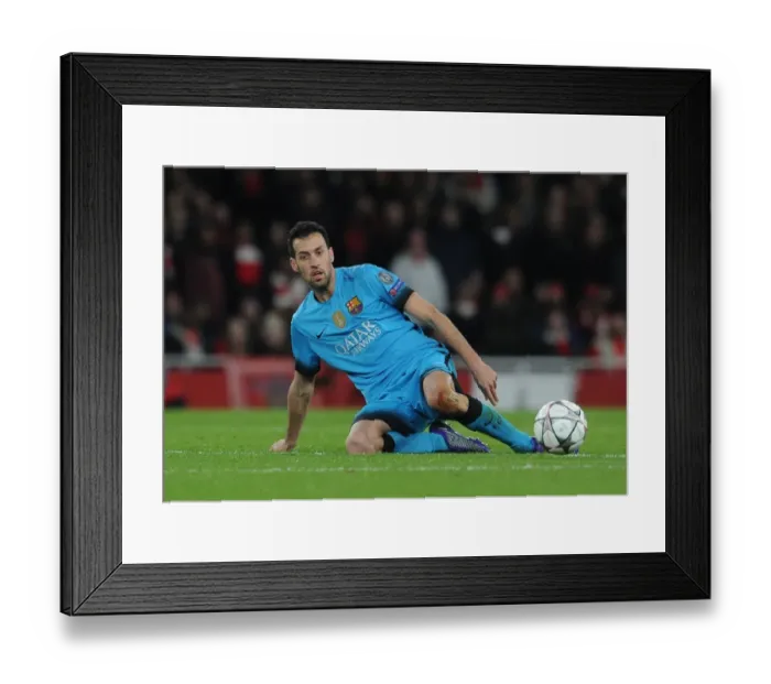 Framed Print : Clash of Champions League Titans: Sergio Busquets Focus Amidst Intense Arsenal vs. Barcelona Rivalry (2016)