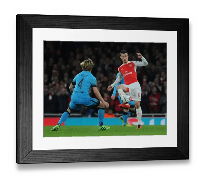 Framed Print : Koscielny vs. Rakitic: A Champions League Battle at the Emirates Framed Print : Koscielny vs. Rakitic: A Champions League Battle at the Emirates