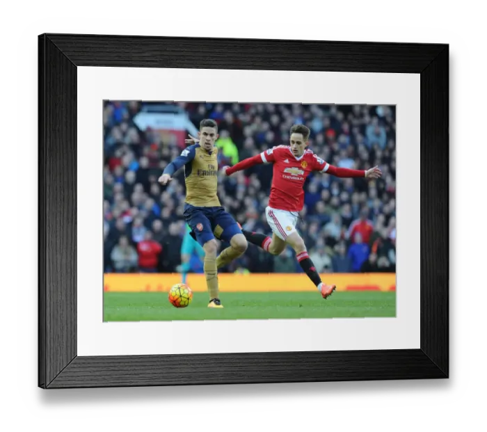 Framed Print : Gabriel vs Januzaj: A Premier League Battle at Old Trafford - Manchester United vs Arsenal, 2015 / 16