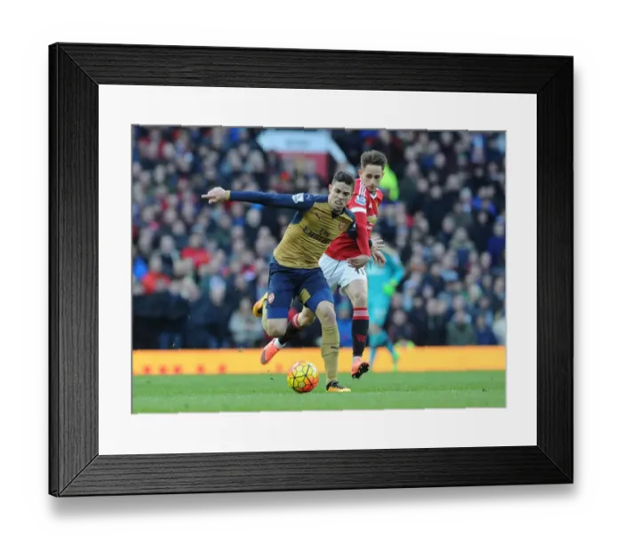 Framed Print : Gabriel vs Januzaj: A Premier League Battle at Old Trafford Framed Print : Gabriel vs Januzaj: A Premier League Battle at Old Trafford