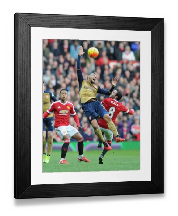 Framed Print : Clash at Old Trafford: Coquelin vs. Mata - Premier League Battle Framed Print : Clash at Old Trafford: Coquelin vs. Mata - Premier League Battle