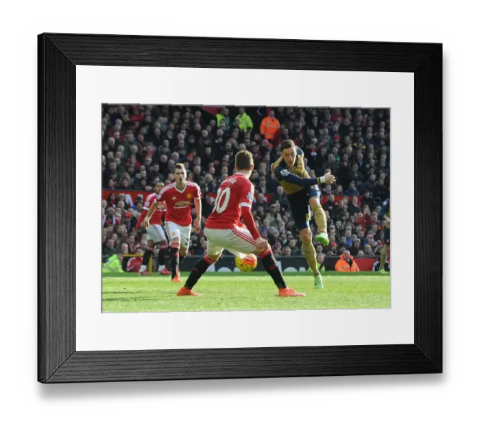 Framed Print : Mesut Ozil Scores the Winning Goal Against Guillermo Varela: Arsenal's Triumph over Manchester United in the Premier League 2015 / 16 Framed Print : Mesut Ozil Scores the Winning Goal Against Guillermo Varela: Arsenal's Triumph over Manchester United in the Premier League 2015 / 16