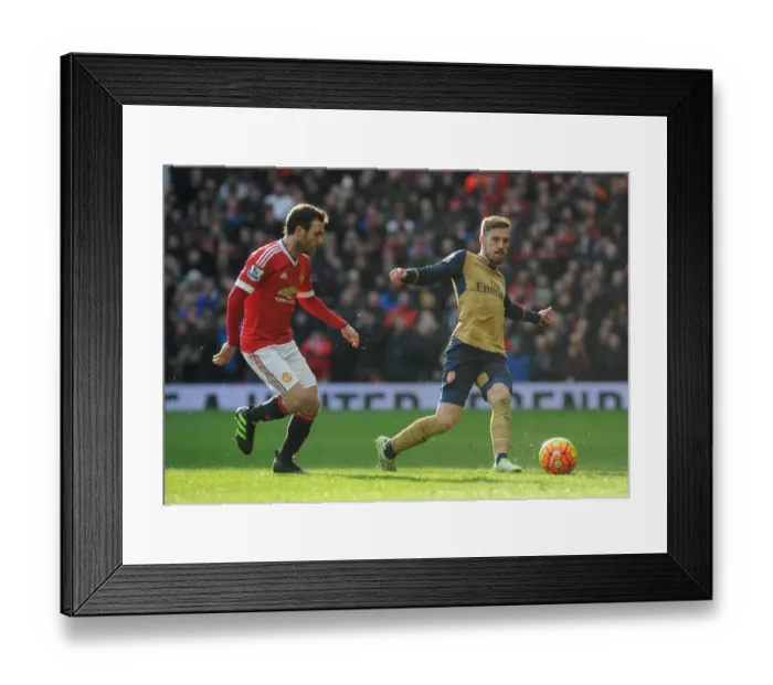 Framed Print : Ramsey vs Mata: Intense Rivalry in the Premier League Clash between Manchester United and Arsenal, 2015 / 16 Framed Print : Ramsey vs Mata: Intense Rivalry in the Premier League Clash between Manchester United and Arsenal, 2015 / 16