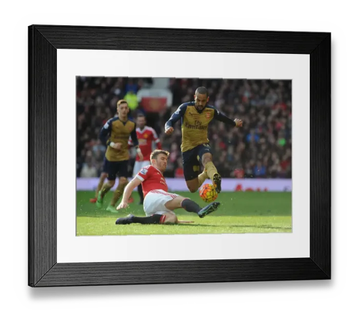 Framed Print : Theo Walcott vs Michael Carrick: A Premier League Showdown at Old Trafford (Manchester United vs Arsenal, 2015 / 16)