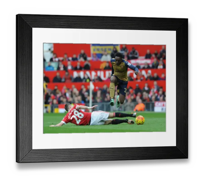 Framed Print : Clash at Old Trafford: Welbeck vs. Schneiderlin - Premier League Battle Framed Print : Clash at Old Trafford: Welbeck vs. Schneiderlin - Premier League Battle