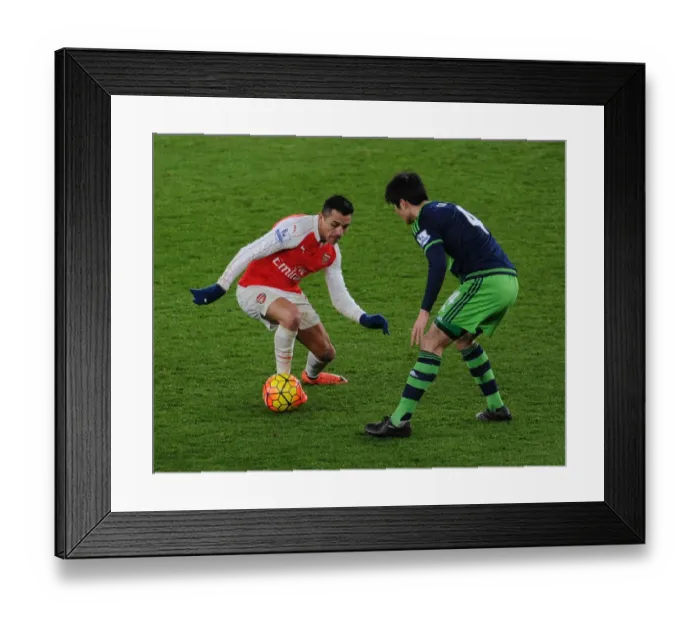 Framed Print : Arsenal vs Swansea City: A Battle of Stars - Alexis Sanchez vs Ki Sung-Yueng