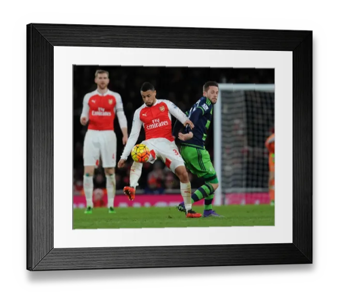 Framed Print : Coquelin Stands Firm: Arsenal vs Swansea's Intense Battle, March 2016 Framed Print : Coquelin Stands Firm: Arsenal vs Swansea's Intense Battle, March 2016