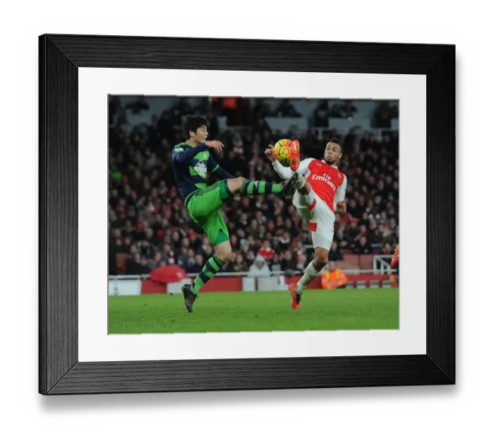 Framed Print : Coquelin vs Ki: Intense Midfield Battle in Arsenal vs Swansea City (2015-16)