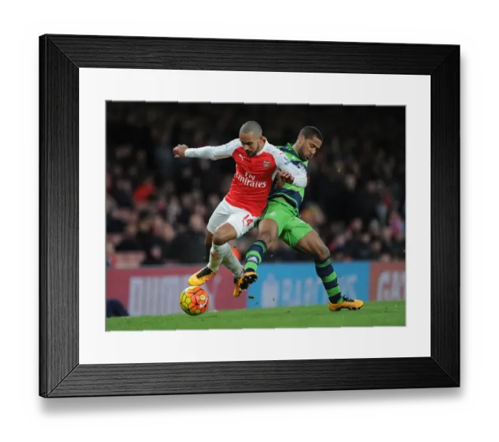 Framed Print : Walcott vs Routledge: A Premier League Showdown - Arsenal vs Swansea Framed Print : Walcott vs Routledge: A Premier League Showdown - Arsenal vs Swansea