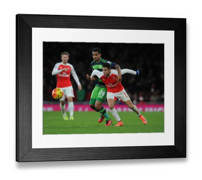Framed Print : Sanchez vs. Naughton: Intense Clash in Arsenal's Victory over Swansea City Framed Print : Sanchez vs. Naughton: Intense Clash in Arsenal's Victory over Swansea City