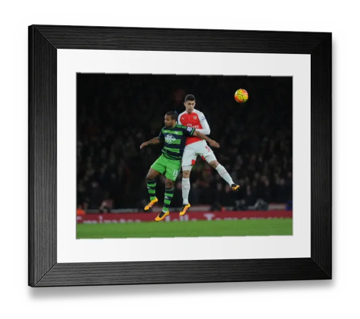 Framed Print : Gabriel vs Routledge: Intense Clash in Arsenal vs Swansea City Premier League Battle Framed Print : Gabriel vs Routledge: Intense Clash in Arsenal vs Swansea City Premier League Battle