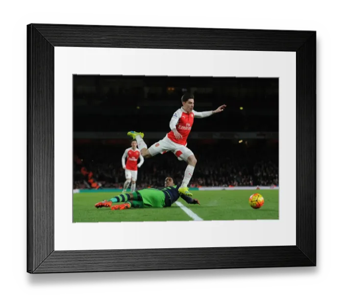 Framed Print : Bellerin Soars Over Fer: Arsenal vs Swansea City Clash Framed Print : Bellerin Soars Over Fer: Arsenal vs Swansea City Clash