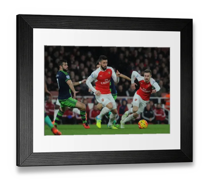 Framed Print : Arsenal's Giroud and Ramsey Outmaneuver Swansea's Amat during Intense Premier League Showdown Framed Print : Arsenal's Giroud and Ramsey Outmaneuver Swansea's Amat during Intense Premier League Showdown