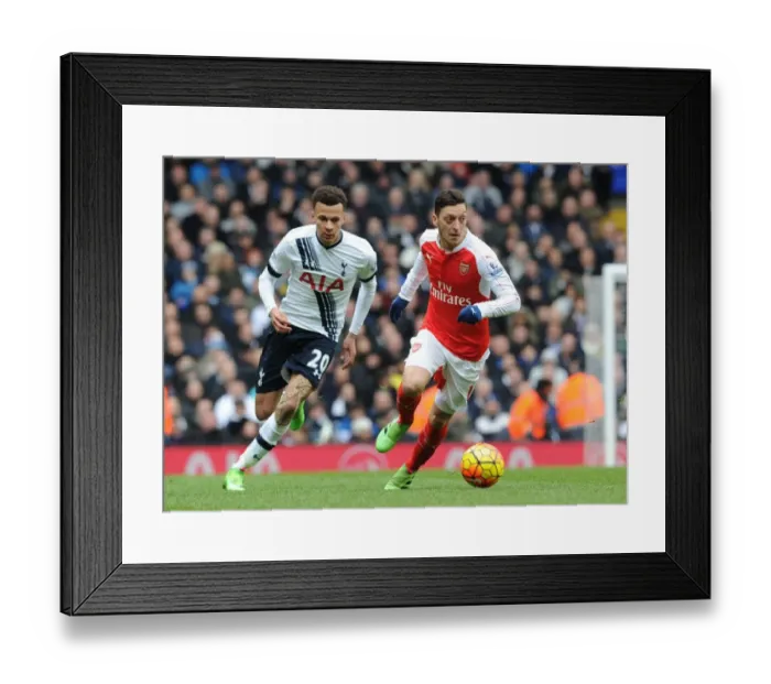 Framed Print : Mesut Ozil Outsmarts Dele Alli: Premier League Showdown between Tottenham and Arsenal, 2015-16