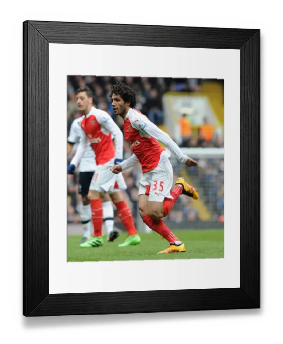 Framed Print : Mohamed Elneny's Unwavering Focus: Arsenal vs. Tottenham Hotspur, Premier League 2015-16