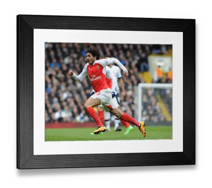 Framed Print : Mohamed Elneny's Unwavering Concentration: Arsenal vs. Tottenham Hotspur, Premier League 2015-16