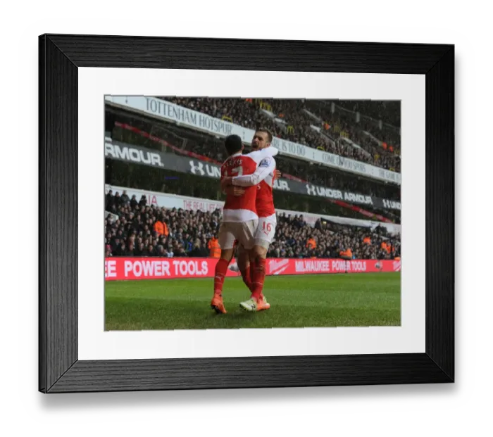 Framed Print : Alexis Sanchez and Aaron Ramsey: Arsenal's Unstoppable Duo Celebrate Goals Against Tottenham Hotspur (2015-16)