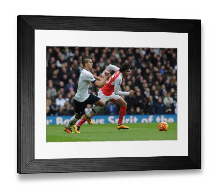 Framed Print : Elneny vs. Lamela: A Premier League Showdown - Arsenal vs. Tottenham