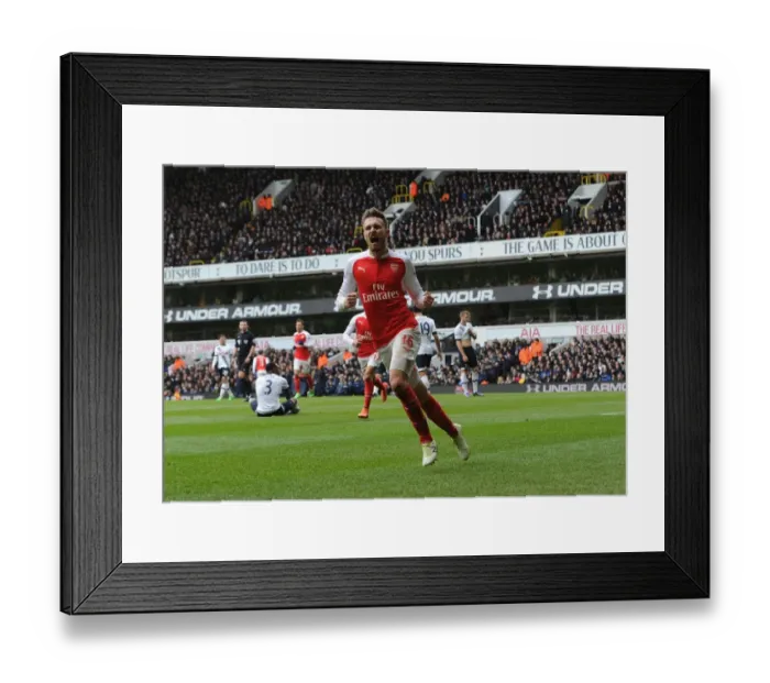 Framed Print : Arsenal's Unforgettable Victory: Ramsey Scores Game-Winning Goal Against Tottenham Hotspur in the Premier League (2015-16) Framed Print : Arsenal's Unforgettable Victory: Ramsey Scores Game-Winning Goal Against Tottenham Hotspur in the Premier League (2015-16)