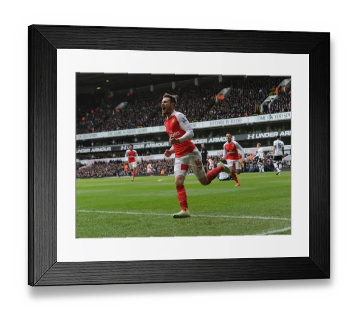 Framed Print : Aaron Ramsey's Thrilling Goal: Arsenal's Triumph over Tottenham Hotspur in the Premier League (2015-16)
