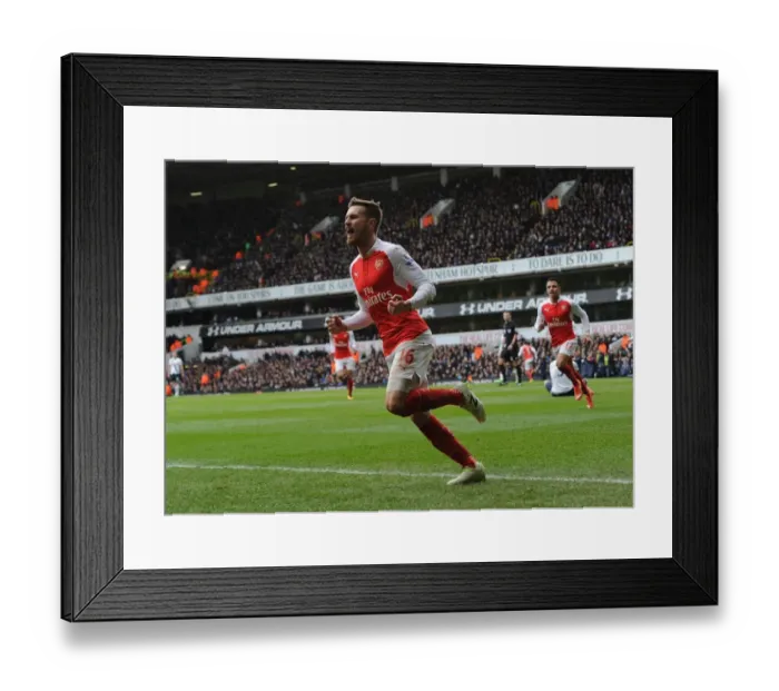 Framed Print : Arsenal's Thrilling Victory: Ramsey's Unforgettable Goal Against Tottenham Hotspur (2015-16)