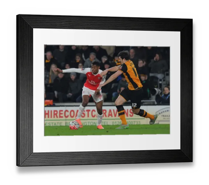 Framed Print : Arsenal's Jeff Reine-Adelaide vs. Harry Maguire: FA Cup Showdown Framed Print : Arsenal's Jeff Reine-Adelaide vs. Harry Maguire: FA Cup Showdown