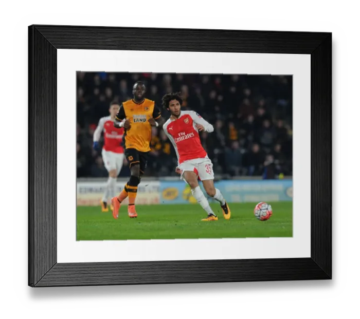 Framed Print : Arsenal's Mohamed Elneny: Unyielding Midfielder Stars in FA Cup Fifth Round Replay Against Hull City Framed Print : Arsenal's Mohamed Elneny: Unyielding Midfielder Stars in FA Cup Fifth Round Replay Against Hull City