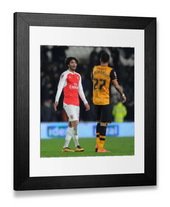 Framed Print : Sportsmanship on the Field: Mohamed Elneny and Ahmed Elmohamady's Heartwarming Moment During FA Cup Fifth Round Replay Between Hull City and Arsenal (2015-16)