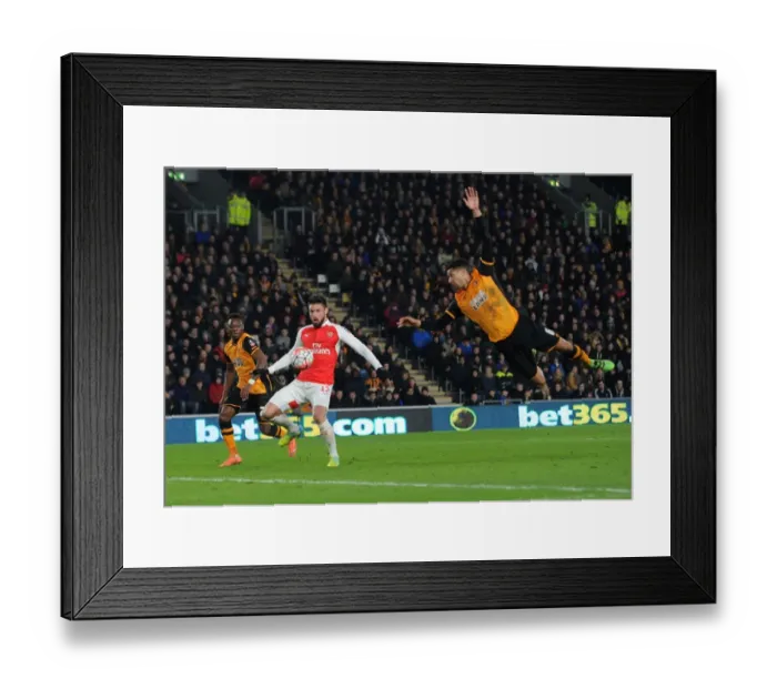 Framed Print : Olivier Giroud Scores Against Hull: FA Cup Fifth Round Replay - Giroud Splits Moses Odubajo and Curtis Davies Framed Print : Olivier Giroud Scores Against Hull: FA Cup Fifth Round Replay - Giroud Splits Moses Odubajo and Curtis Davies