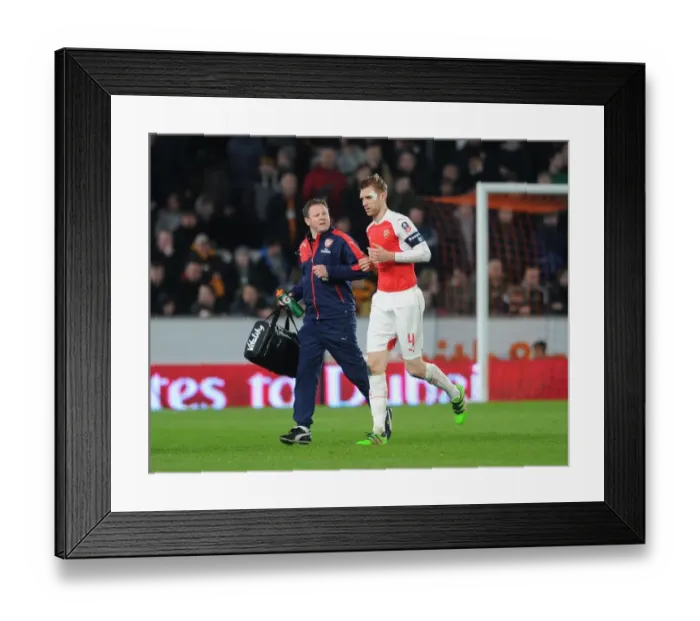 Framed Print : Arsenal's Unwavering Duo: Per Mertesacker and Colin Lewin during the FA Cup Fifth Round Replay vs Hull City