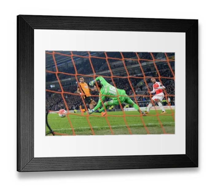 Framed Print : Theo Walcott's Dramatic Hat-Trick: Arsenal Advance in FA Cup with 3-2 Win over Hull City