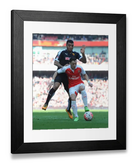 Framed Print : Ozil vs. Deeney: FA Cup Sixth Round Clash at Arsenal